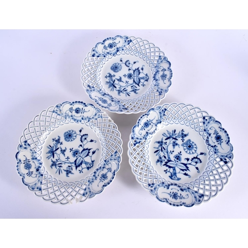 64 - THREE MEISSEN BLUE AND WHITE PORCELAIN PLATES. 23 cm wide. (3)