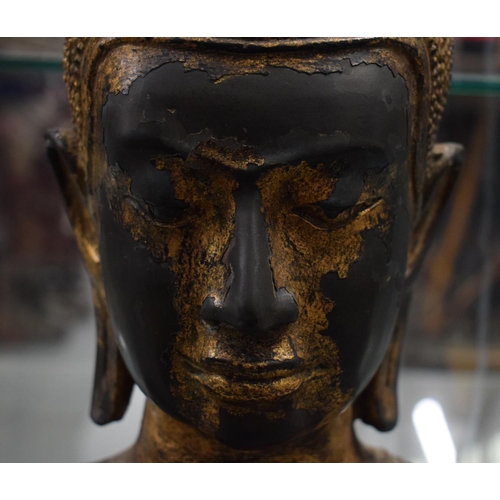 647 - A GOOD LARGE 18TH CENTURY THAI SOUTH EAST ASIAN BRONZE BUDDHA modelled with one hand resting upon hi... 