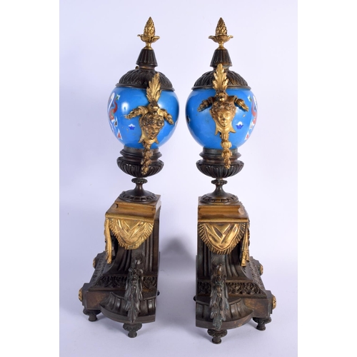 650 - A LARGE 19TH CENTURY FRENCH BRONZE AND PORCELAIN CLOCK GARNITURE painted with motifs. Mantel 42 cm x... 