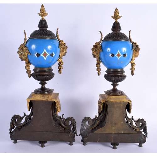 650 - A LARGE 19TH CENTURY FRENCH BRONZE AND PORCELAIN CLOCK GARNITURE painted with motifs. Mantel 42 cm x... 