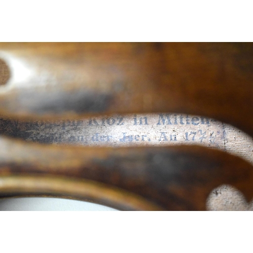 654 - AN ANTIQUE SINGLE PIECE BACK VIOLIN. 59 cm long, length of back 37 cm.