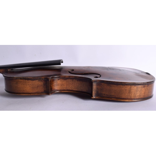 654 - AN ANTIQUE SINGLE PIECE BACK VIOLIN. 59 cm long, length of back 37 cm.