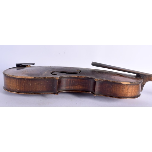 655 - A CASED ANTIQUE SINGLE PIECE BACK VIOLIN with two bows. 59 cm long, length of back 36 cm. (3)