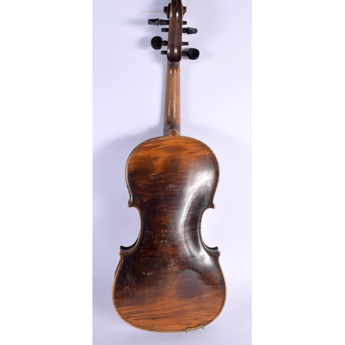 655 - A CASED ANTIQUE SINGLE PIECE BACK VIOLIN with two bows. 59 cm long, length of back 36 cm. (3)