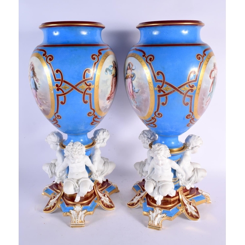 661 - A LARGE PAIR OF 19TH CENTURY FRENCH BISQUE GLAZED PARIS PORCELAIN VASES painted with figures within ... 