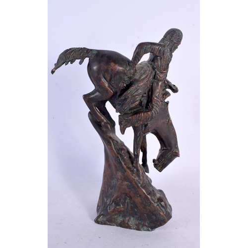 670 - AN ANTIQUE EUROPEAN BRONZE FIGURE OF A MALE ON HORSEBACK modelled rearing. 24 cm x 12 cm.