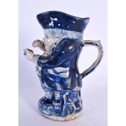 680 - AN 18TH/19TH CENTURY DUTCH DELFT MINIATURE CHARACTER JUG. 13 cm high.