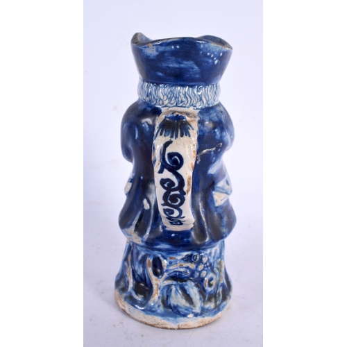 680 - AN 18TH/19TH CENTURY DUTCH DELFT MINIATURE CHARACTER JUG. 13 cm high.