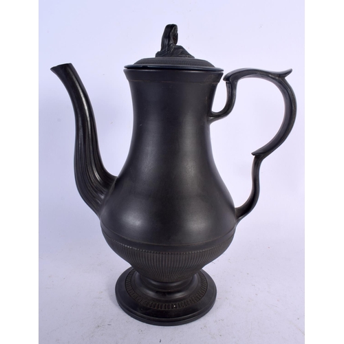 686 - A 19TH CENTURY ENGLISH BLACK BASALT COFFEE POT AND COVER together with an unusual black basalt plaqu... 