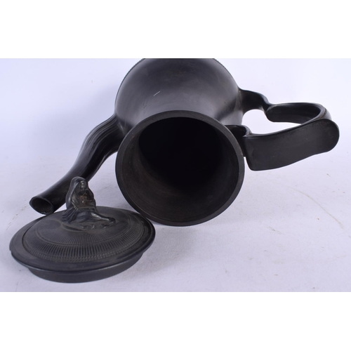 686 - A 19TH CENTURY ENGLISH BLACK BASALT COFFEE POT AND COVER together with an unusual black basalt plaqu... 