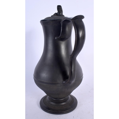 686 - A 19TH CENTURY ENGLISH BLACK BASALT COFFEE POT AND COVER together with an unusual black basalt plaqu... 