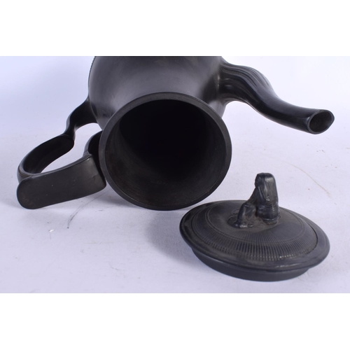 686 - A 19TH CENTURY ENGLISH BLACK BASALT COFFEE POT AND COVER together with an unusual black basalt plaqu... 