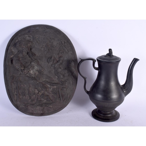 686 - A 19TH CENTURY ENGLISH BLACK BASALT COFFEE POT AND COVER together with an unusual black basalt plaqu... 