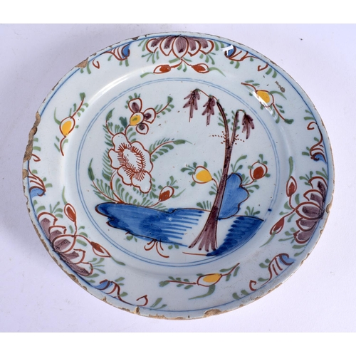 693 - THREE 18TH CENTURY ENGLISH DELFT TIN GLAZED PLATES. 22 cm wide. (3)