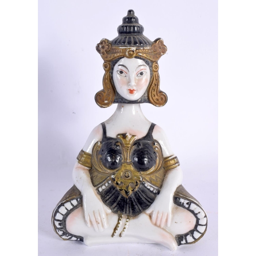 70 - A RARE ART DECO FRENCH NODDING PORCELAIN MATCH HOLDER formed as an Oriental female. 12 cm x 6 cm.