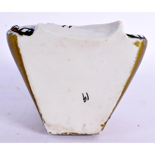 70 - A RARE ART DECO FRENCH NODDING PORCELAIN MATCH HOLDER formed as an Oriental female. 12 cm x 6 cm.