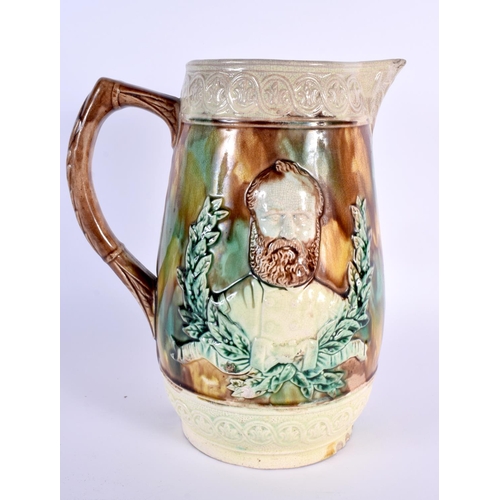 700 - AN UNUSUAL LARGE 19TH CENTURY MAJOLICA POTTERY JUG depicting figures in relief. 26 cm x 17 cm.