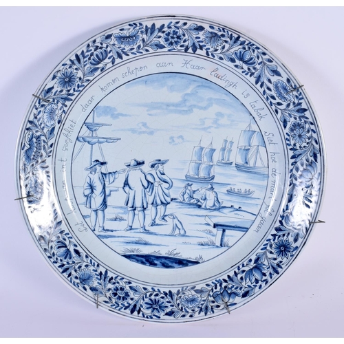 705 - THREE LARGE ANTIQUE DELFT BLUE AND WHITE TIN GLAZED PLATES. 32 cm diameter. (3)