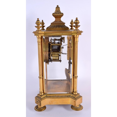 706 - A MID 19TH CENTURY FRENCH ORMOLU FOUR GLASS REGULATOR CLOCK. 34 cm x 14 cm.