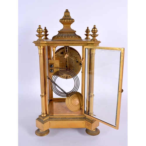 706 - A MID 19TH CENTURY FRENCH ORMOLU FOUR GLASS REGULATOR CLOCK. 34 cm x 14 cm.