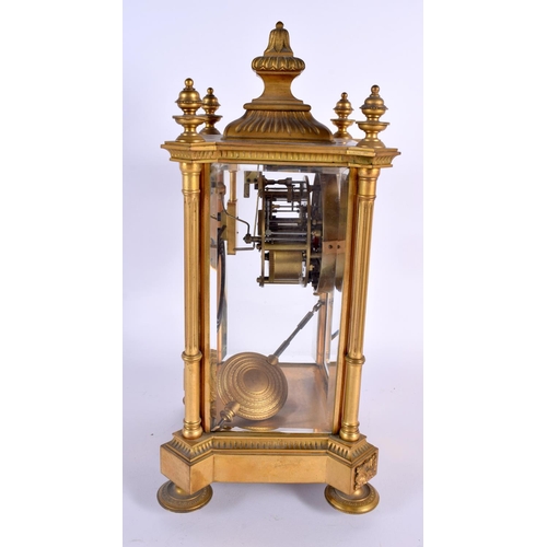 706 - A MID 19TH CENTURY FRENCH ORMOLU FOUR GLASS REGULATOR CLOCK. 34 cm x 14 cm.