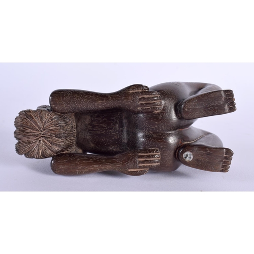 717 - AN UNUSUAL CONTINENTAL CARVED WOOD PIPE RACK. 12 cm x 5 cm.