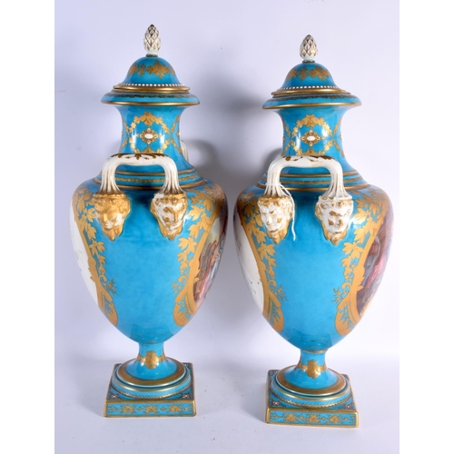 72 - A GOOD LARGE PAIR OF 19TH CENTURY FRENCH SEVRES PORCELAIN VASES AND COVERS painted with birds and fi... 