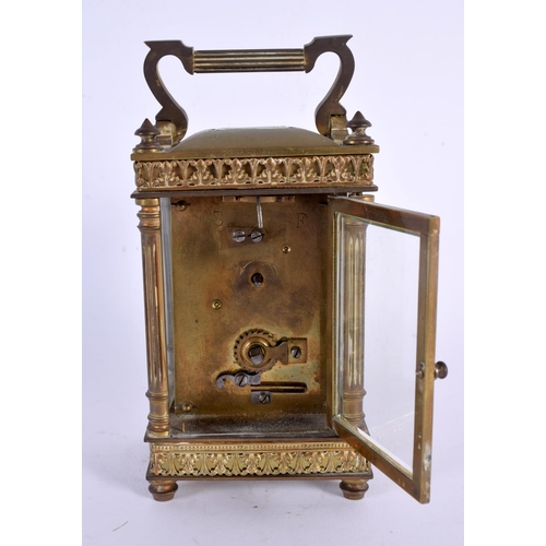 721 - AN ANTIQUE FRENCH GLASS CARRIAGE CLOCK. 15 cm high.