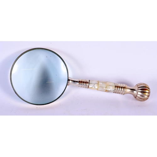 729 - A CONTINENTAL SILVER PLATED MOTHER OF PEARL MAGNIFYING GLASS. 25 cm x 10 cm.