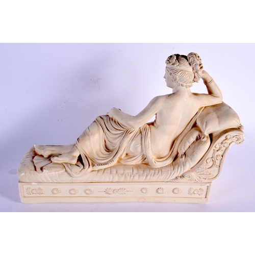 732 - A CLASSICAL COUNTRY HOUSE PLASTER FIGURE OF A FEMALE modelled upon a relief decorated sofa. 38 cm x ... 