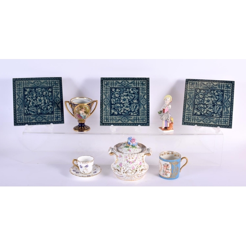 734 - THREE ARTS AND CRAFTS TILES together with a Sevres cup etc. (8)