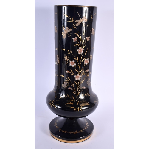 737 - A LARGE VICTORIAN BLACK OPALINE GLASS VASE decorated with foliage and birds. 46 cm x 12 cm.