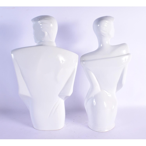 74 - A STYLISH PAIR OF 1980S WHITE GLAZED POTTERY FIGURES modelled in the deco style. 39 cm x 14 cm.