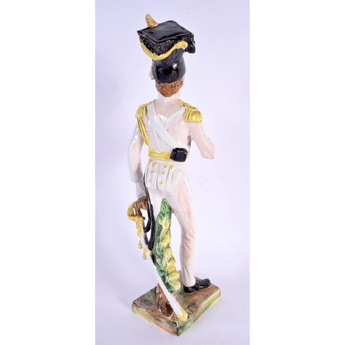 744 - A LARGE ITALIAN FAIENCE POTTERY FIGURE OF A SOLDIER. 39 cm high.