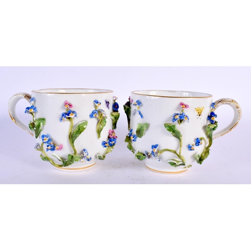 746 - A PAIR OF GERMAN MEISSEN PORCELAIN ENCRUSTED PORCELAIN CUPS AND SAUCERS painted with insects and fol... 