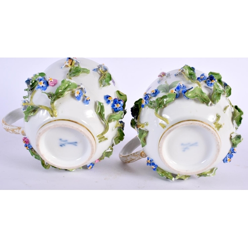 746 - A PAIR OF GERMAN MEISSEN PORCELAIN ENCRUSTED PORCELAIN CUPS AND SAUCERS painted with insects and fol... 