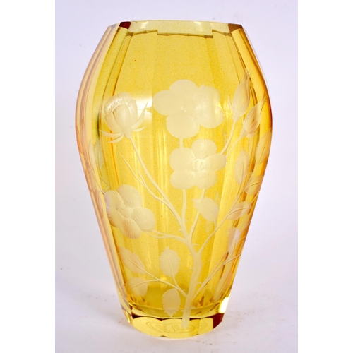 748 - A BOHEMIAN AMBER GLASS VASE etc. Largest 15 cm wide. (4)