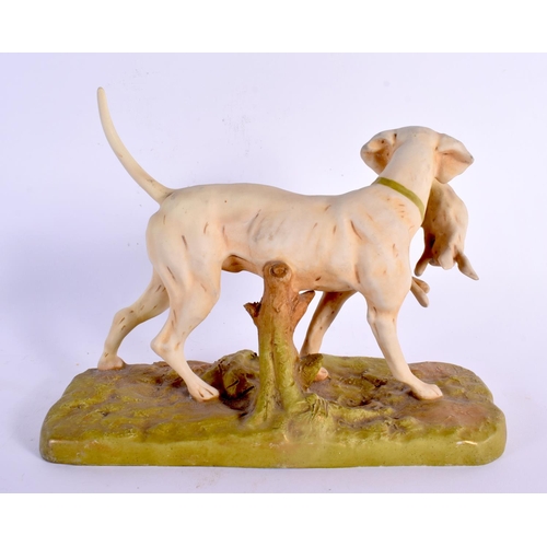 750 - A ROYAL DUX PORCELAIN FIGURE OF A DOG. 24 cm x 20 cm.