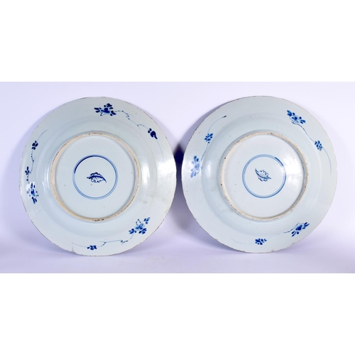 751 - A LARGE PAIR OF 17TH/18TH CENTURY CHINESE BLUE AND WHITE PORCELAIN DISHES Kangxi. 39 cm wide.