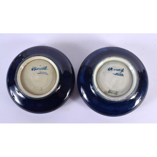 757 - A PAIR OF MOORCROFT DISHES. 10 cm diameter.