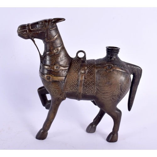 772 - A 17TH/18TH CENTURY INDIAN BRONZE FIGURE OF A HORSE modelled with engraved motifs. 21 cm x 18 cm.