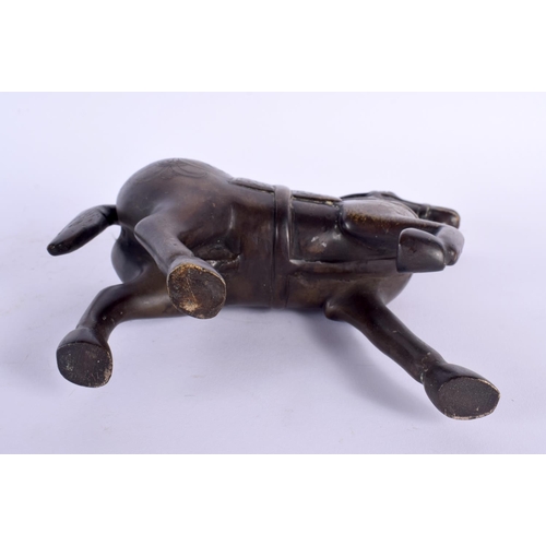 772 - A 17TH/18TH CENTURY INDIAN BRONZE FIGURE OF A HORSE modelled with engraved motifs. 21 cm x 18 cm.