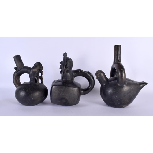 778 - THREE SOUTH AMERICAN BLACK POTTERY VESSELS. Largest 24 cm x 14 cm. (3)