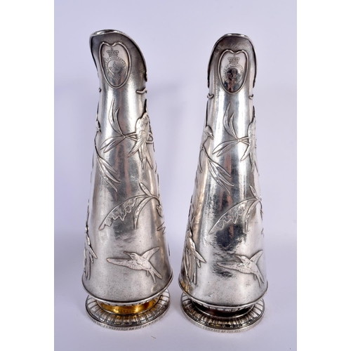 792 - A RARE LARGE PAIR OF ELKINGTONS AESTHETIC MOVEMENT SILVER PLATED JUGS decorated all over with birds ... 