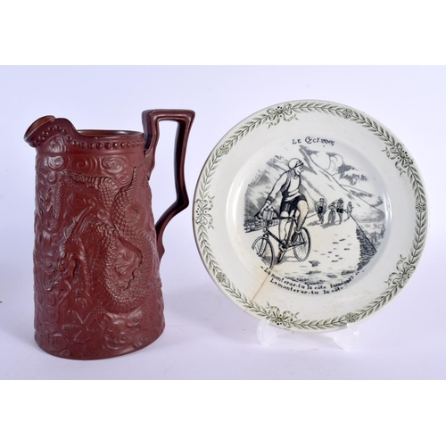 8 - A RARE ANTIQUE FRENCH CYCLING POTTERY PLATE together with an English pottery dragon jug. Largest 18 ... 