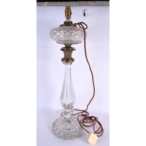 811 - A LARGE EARLY 19TH CENTURY CRYSTAL CUT GLASS LAMP. 65 cm x 15 cm.