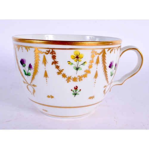 813 - AN ANTIQUE CONTINENTAL PORCELAIN CUP AND SAUCER together with a pair of glass vases etc. Largest 18 ... 