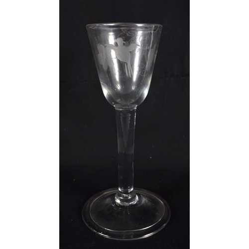 835 - AN ANTIQUE WINE GLASS. 15 cm high.