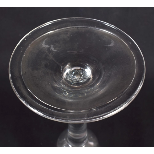 835 - AN ANTIQUE WINE GLASS. 15 cm high.