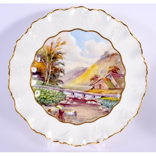 85 - Royal Crown Derby pair of plates painted by W. E. J. Dean, signed,  with named scenes of Monsal Dale... 